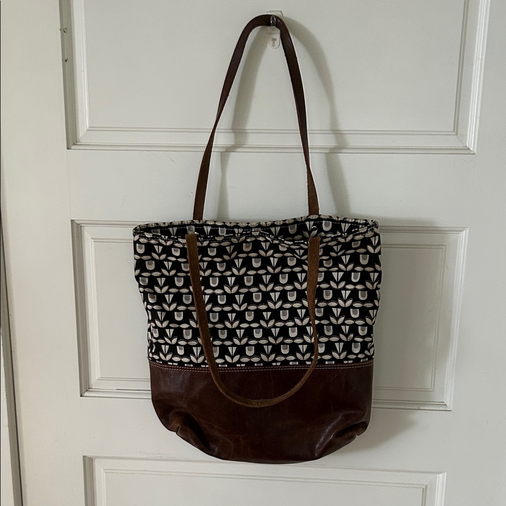 Red Staggerwind leather and fabric tote. Hand made and very durable.